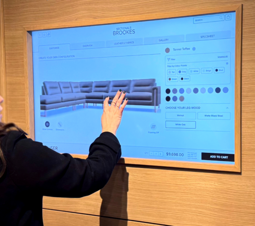 Woman using a 3D product configurator for furniture on a touchscreen
